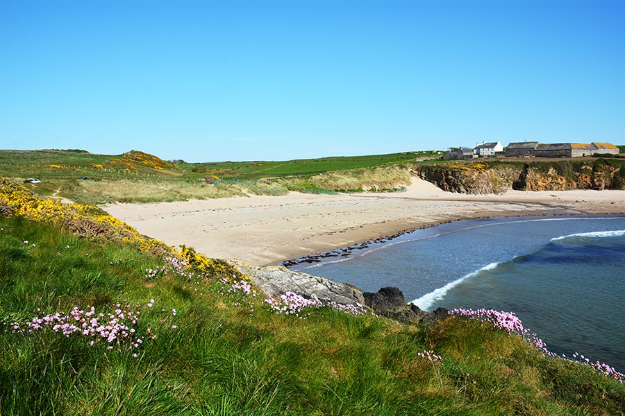 The beautiful sandy beach at Cable bay on Anglesey in North Wales