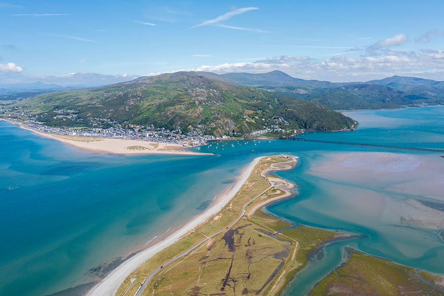 An aerial view of Barmouth, a small welsh seaside town on the mouth of the Mawddach estuary, Gwynedd, Snowdonia National Park, Wales